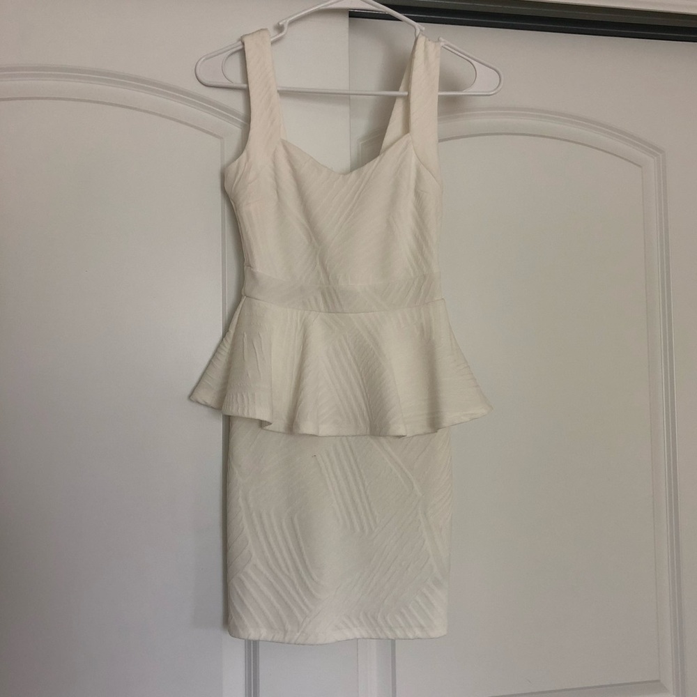 White peplum dress